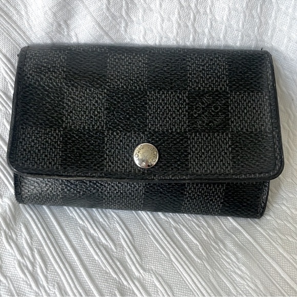 Authentic Louis Vuitton Gray Ebene Leather Key
Holder Wallet - Picture 1 of 8